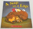 画像1: A Nap in a Lap◇小さな女の子がいろいろな場所で心地よくお昼寝する様子を描いた、綴りやすくてやさしい英語絵本 (1)