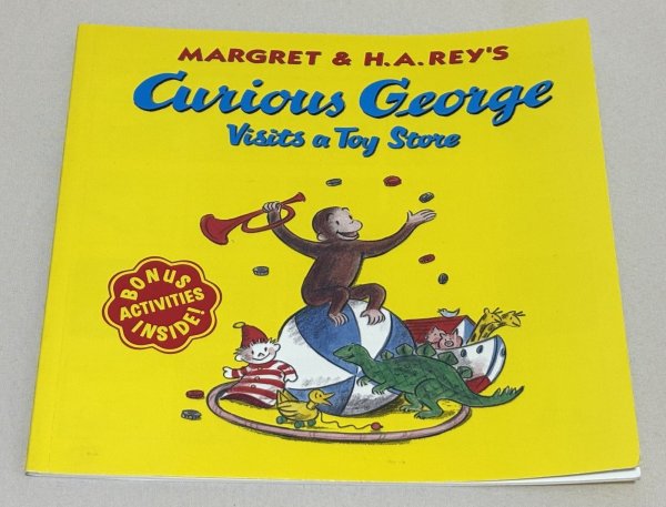 画像1: Curious George Visits a Toy Store◇ジョージが新しくできたおもちゃ屋さんに行って、わくわくしながら大騒ぎしちゃうお話 (1)